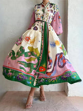 Einzigartiges und schönes Langarm-Midikleid im Hemdstil mit Retro-Print